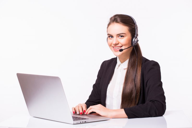 young-woman-working-office-with-laptop-headphones-white-wall-customer-service-call-center-e1649995706994